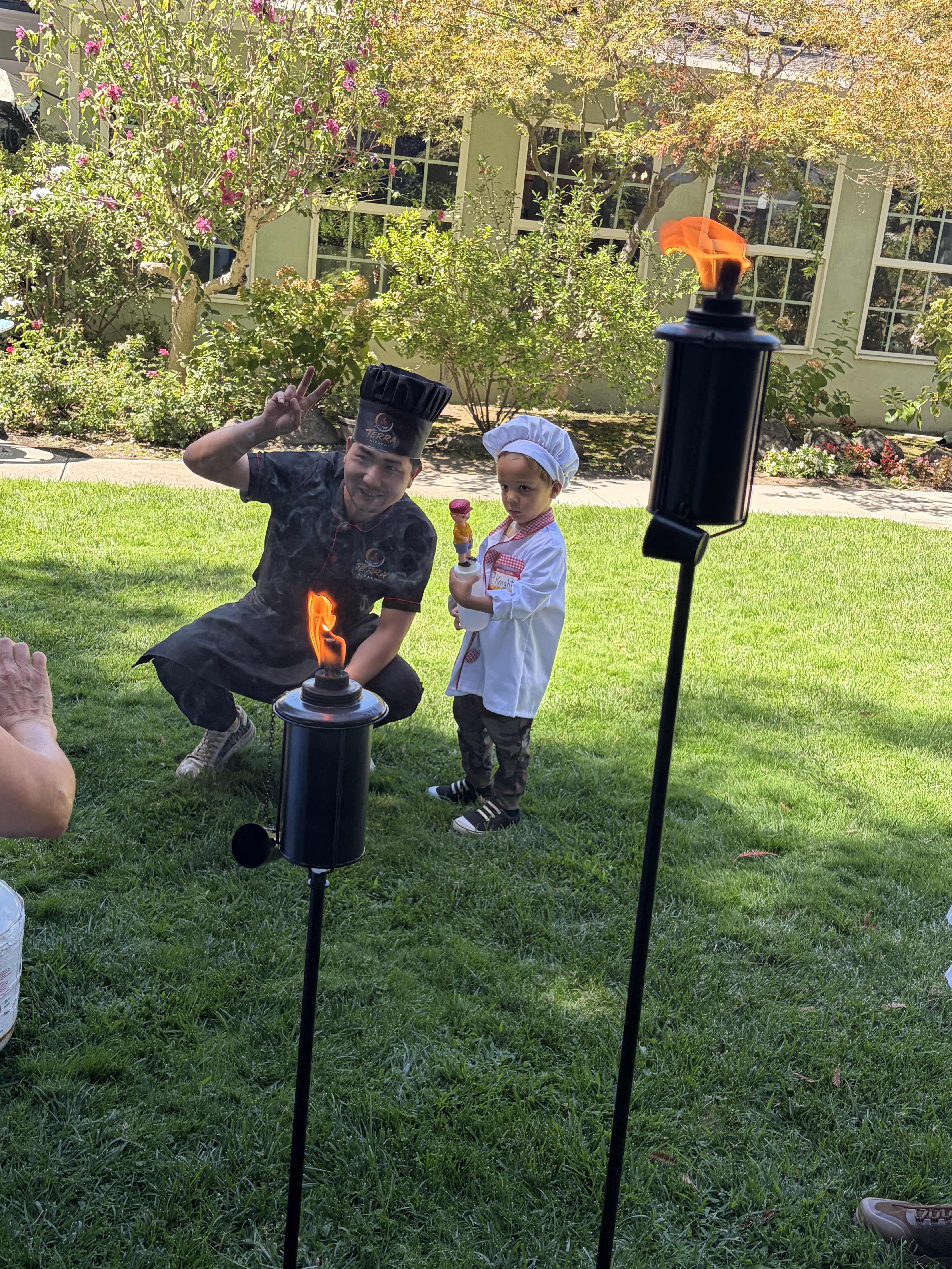 Terra Hibachi chef posing with a young guest in Vallejo, CA